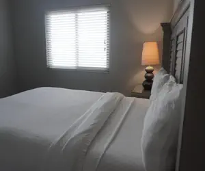 Photo 2 - Newly Renovated 102 2BD Condo with Riverview Balcony