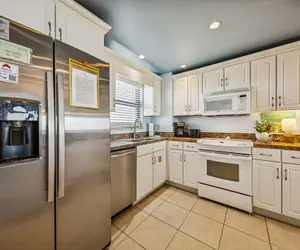 Photo 5 - Tastefully Decorated Condo with Scenic Beach Views