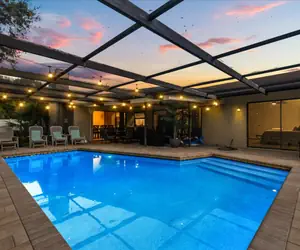 Photo 2 - Modern Family Retreat • Pool + BBQ + Foosball • Close to Downtown