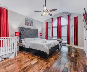 Photo 4 - Discount Included! Stunning, Modern, Spacious Getaway Fits Any Group, 2 Game Rooms, Hot Tub 5 Bedroom Home by Redawning