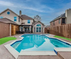 Photo 2 - Discount Included! Stunning, Modern, Spacious Getaway Fits Any Group, 2 Game Rooms, Hot Tub 5 Bedroom Home by Redawning