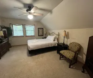 Photo 5 - Lake view two bedroom, two bath loft, log-sided cottage with private hot tub overlooking Lake Ouachita. by RedAwning