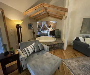 Photo 3 - One bedroom, one bath log-sided cottage with private hot tub on Lake Ouachita. by RedAwning