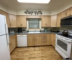 Photo 5 - One bedroom, one bath log-sided cottage with private hot tub on Lake Ouachita. by RedAwning