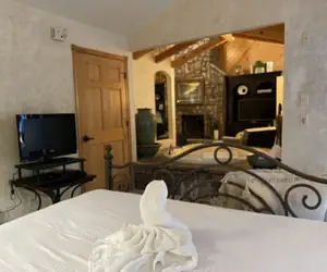 Photo 2 - One bedroom, one bath log-sided cottage with private hot tub on Lake Ouachita. by RedAwning