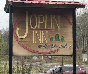 Photo 5 - King Guest Room located at the Joplin Inn at the entrance to Mountain Harbor, just 2 1/2 miles from Lake Ouachita. by RedAwning