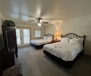 Photo 3 - C16, Two bedroom, two bath, log-sided Harbor North luxury cottage with hot tub overlooking Lake Ouachita. by RedAwning