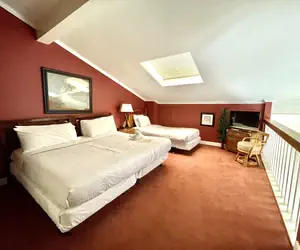 Photo 2 - 80BPD, Four bedroom, two 1/2 bath log-sided condo with lake view , garage by RedAwning