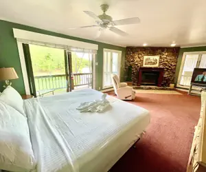 Photo 3 - 80BPD, Four bedroom, two 1/2 bath log-sided condo with lake view , garage by RedAwning