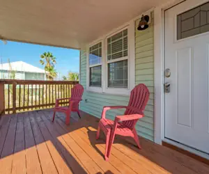 Photo 2 - 2-unit Home in Golf Cart Zone w Patio Balcony Salty Sunshine Multi-family Retreat