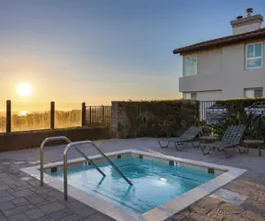 Photo 2 - Walk to Beach Pool, Hot Tub, Private Patio, Parking Seabreeze Retreat