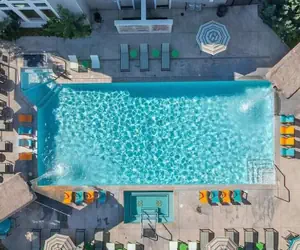 Photo 5 - New Upscale 1BR Stay With Mini Golf Sauna Heated Pool