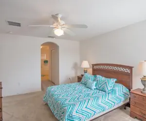 Photo 2 - South Facing Pool Plenty Of Sunshine! (230671) 4 Bedroom Home by RedAwning