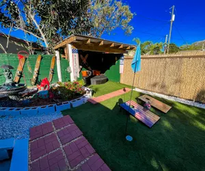 Photo 3 - Hammocks & Mini-Golf! 10 mins from Beach! KING Bed!