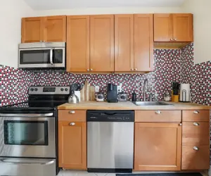 Photo 4 - Cozy 3BR Retreat Near Main St w/ Full Kitchen