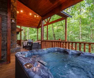Photo 4 - Rated Top 10 One Bedroom + Oversized Deck + Game Room + Prime Location + Hot Tub