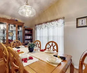 Photo 3 - 15 Min to Disney | Spacious 4BR Home w/ Pool