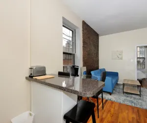 Photo 3 - Cozy 1BR in Murray Hill – Near Empire State & GC