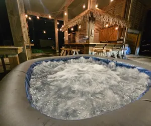 Photo 3 - Tiki Bar, King Bed, Arcade, Hot Tub, 4min to Beach