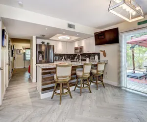 Photo 4 - Dog Friendly Home by Flagler Avenue! Fenced Yard and Garage! Walk to the Beach!