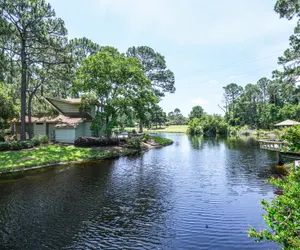 Photo 5 - Charming Cottage*6 Seat Cart Included*Pool & Beach Access*Patio Overlooking Lake