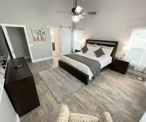 Photo 3 - Phenomenal 7BR 4 Master Suites Southeast Pool Hot Tub Gas BBQ 2 Miles to Disney