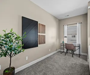 Photo 2 - Top Floor! Garage Included + New Onsite Gym!