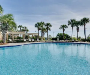 Photo 2 - Golf Cart Now Incl'd! June 13-16 Available! Tiki Bar~Tropical Pool Deck~On Beach