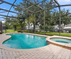 Photo 2 - Luxury 5BR Villa Near Disney w/ Pool & Game Room