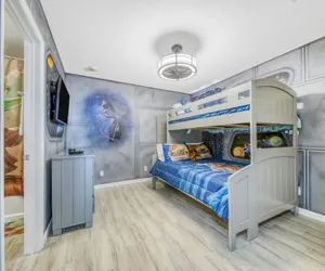 Photo 4 - Luxury 5BR Villa Near Disney w/ Pool & Game Room