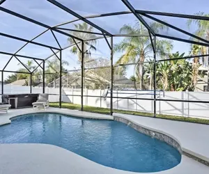 Photo 4 - Luxurious 2 Masters Privacy Fenced Pool & Hot Tub BBQ Game Room  2 miles Disney