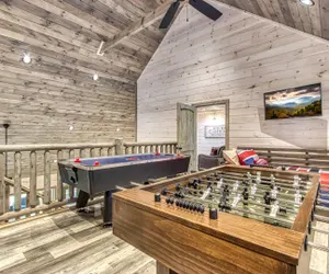 Photo 3 - Luxe 4BR Near Pigeon Forge | Indoor Pool Theater Game Room Sleeps 12 Pirate Ship