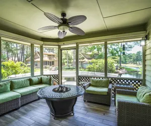 Photo 4 - Charming Cottage*6 Seat Cart Included*Pool & Beach Access*Patio Overlooking Lake