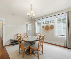 Photo 3 - Cozy 3BR Retreat Near Main St w/ Full Kitchen