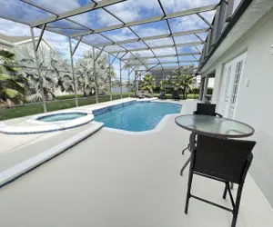 Photo 3 - Magical Lakeview (4 Master Suites) Pool Hot Tub BBQ Home Theater 2 Miles Disney