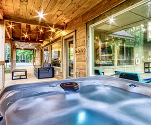 Photo 2 - Luxe 4BR Near Pigeon Forge | Indoor Pool Theater Game Room Sleeps 12 Pirate Ship