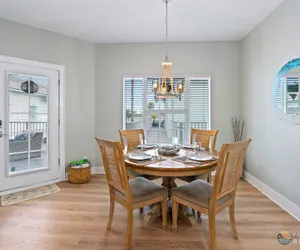 Photo 3 - ON Flagler Avenue! Dog Friendly with Balcony and Parking. Walk to the Beach!