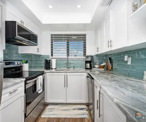 Photo 3 - Ocean View Balcony just STEPS to the Beach with Pool, Parking and Wi-Fi!