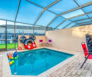 Photo 2 - Magical Getaway Close to Disney! Pool, Gym, & WiFi