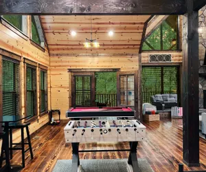 Photo 2 - Rated Top 10 One Bedroom + Oversized Deck + Game Room + Prime Location + Hot Tub