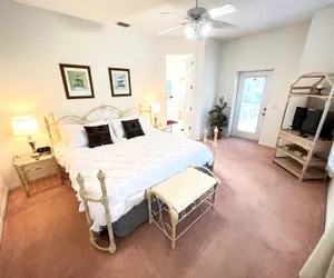 Photo 5 - Stylish Lakefront Cottage w/Huge South Facing Pool Hot Tub BBQ - 2 miles Disney!