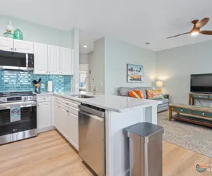 Photo 2 - ON Flagler Avenue! Dog Friendly with Balcony and Parking. Walk to the Beach!