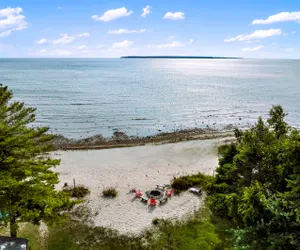 Photo 2 - Lake Huron Beachfront Home~Mackinac Island Views!