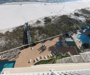 Photo 4 - Beachfront Beauty | Pools, Balcony, Prime Location
