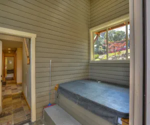 Photo 2 - Hutson's Bridgeview House with HotTub & Huge Walk in Shower - 30 day min