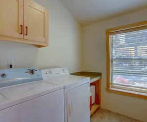 Photo 3 - Hutson's Bridgeview House with HotTub & Huge Walk in Shower - 30 day min