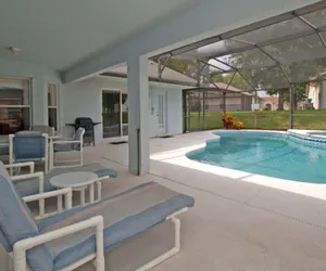 Photo 2 - 4 BR / 3 BA orlando vacation pool home in Clermont, BBQ Grill, Free Wifi!!
