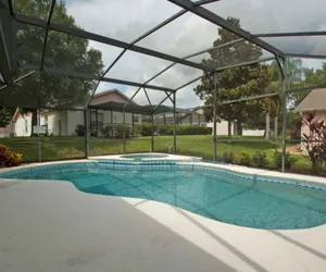 Photo 3 - 4 BR / 3 BA orlando vacation pool home in Clermont, BBQ Grill, Free Wifi!!