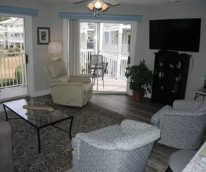 Photo 3 - Brunswick Plantation Resort Villa 308 with Sleek Interior and Golf Course Onsite