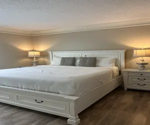 Photo 2 - Newly Renovated 102 2BD Condo with Riverview Balcony